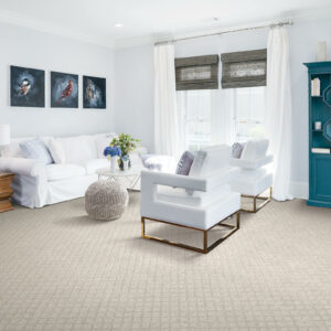 sensational charming area room set with square brown patterns rug flooring, and a white couch with two luxury chairs