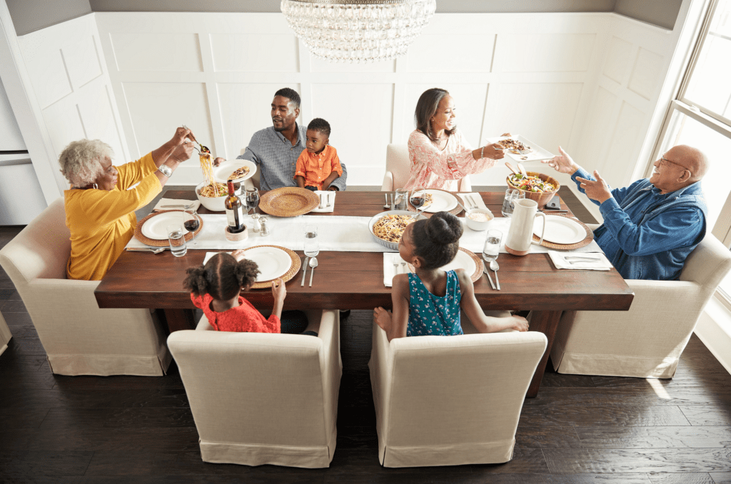 Family having breakfast at the dining table | Brian's Flooring & Design